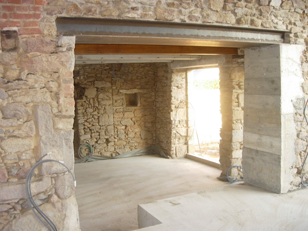 Ouverture de mur en pierre, en béton à Montmartin-sur-Mer